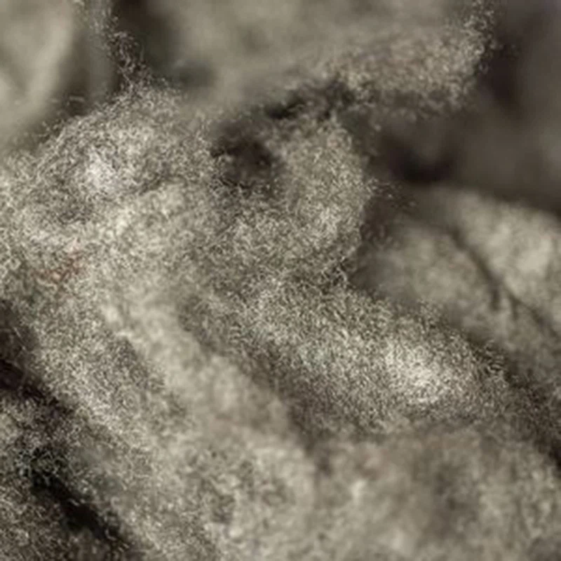 Fibres discontinues conductores de teixit